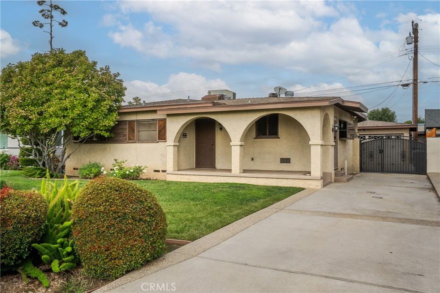 Welcome to this charming Covina home, beautifully maintained and full of character. From the moment you arrive, you’ll notice the impressive curb appeal and pride of ownership that shines throughout.

Step inside to an inviting living area featuring a cozy corner nook with a built-in desk, perfect for a home office or creative space. Throughout the home, you’ll find thoughtful built-ins and custom craftsmanship that add warmth and detail to every corner.

The main living room is filled with natural light and includes a custom-built bar, ideal for entertaining. The kitchen offers generous counter space, rich wooden cabinetry, and a casual dining area perfect for everyday meals. A second living space with a classic brick fireplace provides the perfect spot to unwind on cool evenings.

With 1,593 sq. ft. of comfortable living space, this home offers 3 bedrooms and 2 bathrooms, including a primary bedroom with a walk-in closet and private bathroom. 

The property’s true hidden gem is the detached living space, complete with its own bedroom and bathroom. Offering extra space for guests, extended family, or a private retreat.

Outside, you’ll find a private backyard with a patio, storage area, and grassy yard, perfect for relaxing or entertaining. The detached 1 car garage includes built-in storage, and laundry hookups for added convenience.

Located near shopping, schools, and major freeways, this Covina home offers comfort, versatility, and timeless appeal. Don’t miss the opportunity to make it yours! (Broker, broker’s agents, and employees do not represent or guarantee the accuracy of square footage, bedroom/bathroom count, lot size or dimensions, permitted or unpermitted spaces, school boundaries or eligibility, or any other property information. Buyers are advised to complete their own due diligence to verify all information.)