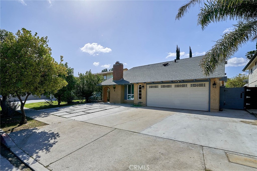 Beautiful 2 story home in Winnetka. This well maintained home features hardwood floors and recessed lighting throughout. Bright and spacious living room has a vaulted ceiling, large windows and a custom fireplace. Formal dining area followed by a fantastic kitchen with granite countertops, stainless steel appliances and a center island. Adjacent is a family room with access to the backyard. Large backyard has ample room for entertaining family and friends. There is also a small storage shack in the backyard. Stunning master bedroom with a ceiling fan and a spacious master bath with tile floors, and a custom walk in shower. Second floor features 2 bedrooms with vaulted ceilings and a nice and large bathroom. This home features a solar panel system for incredible energy savings. AC, furnace, windows, electric panel, 2nd laminate floors were all done or replaced around 3 years ago. 2 car garage and so much more