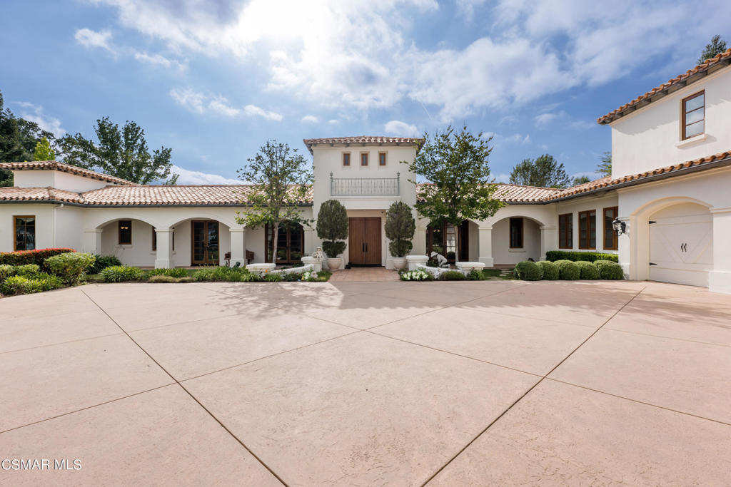 Welcome home to a stunning 8,200+ square-foot estate with spectacular views of this idyllic Sherwood community. This single story home features 5 spacious bedrooms and 6 baths, plus an additional upstairs apartment above the garage-- perfect for hosting extended family or entertaining guests. Entry opens into a grand great room, with soaring ceilings throughout. State-of-the-art automatic blinds installed in all rooms. Main level primary suite includes separate his & hers en-suites. French doors offer a panoramic view of the backyard, which features a sparkling pool, spa and lush greenery. This is Southern California living at its best!