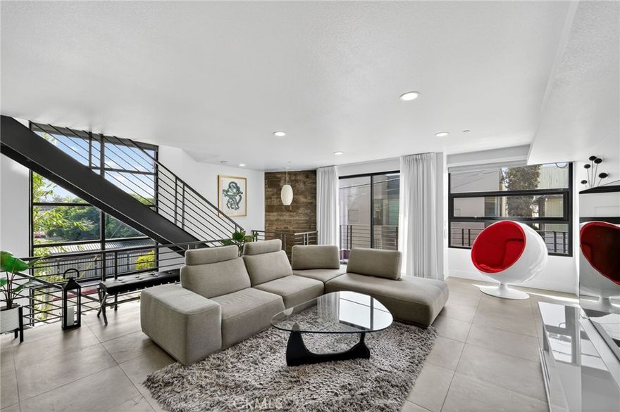 Live the Venice Beach lifestyle in this stunning, modern, 3-story condo perfectly located just seconds from the beach, Venice Sign, and Abbot Kinney. This 2 bedroom, 2.5 bathroom live/work corner unit home combines sleek design with coastal living. Flooded with natural light and refreshed by the ocean breeze, the home features an open floor plan with polished concrete floors, an entertainer's kitchen with upgraded appliances, and an inviting office space. 



The expansive primary suite spans the entire third floor complete with walk-in closet, spa-inspired bathroom, and direct access to the rooftop terrace. This smart home is fully equipped with a Nest Learning Thermostat, myQ Smart Garage, Nest Video Doorbell, Somfy electronic shades, video security system, and Schlage Wi-Fi Smart Door Lock for convenient keyless entry. The private, direct-entry 2 car garage features epoxy floors and an EV charger. A private balcony, automatic window coverings, and central A/C add to the year-round comfort. Don't miss your chance to enjoy the best of Venice Beach living in a stylish, modern space designed for both relaxation and entertaining.



Available fully furnished.



Minimum 1 year lease term.