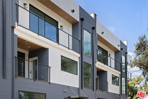 Photo of 6050 E Burwood Ave, Los Angeles, CA 90042 (MLS # 26648583)