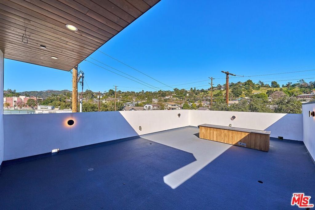 Photo of 6050 E Burwood Ave, Los Angeles, CA 90042 (MLS # 26648583)