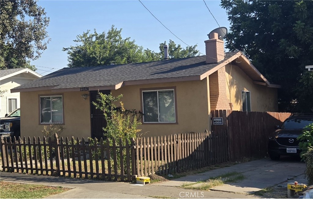 Picket fence home in desirable neighborhood near uptown Whittier. Perfect for first time buyers. New flooring, new paint, new window coverings, new ceiling fans, new bathroom vanity and toilet. Front and gated back yard. No garage, but plenty of space to build one or an ADU. Walking distance to the QUAD and Whittier Greenway Trail.