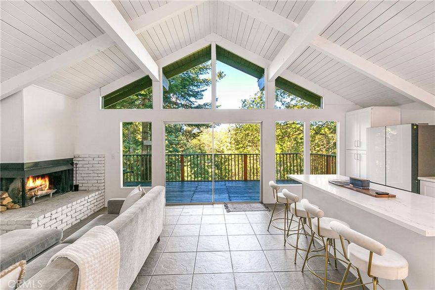 Picture walking into a stunning 1960s cabin with jaw-droppingly high vaulted ceilings, all recently painted a beautiful bright White and, as you slowly move further into the living area, you're hit with the most breathtaking (and totally unobstructed) views of the forest framed to absolute perfection by the classic A Frame windows that tells you instantly: you're in the mountains! Add a fully remodeled kitchen to all that featuring exquisite white quartz countertops with gorgeous flecks of gold that catch your eye, floating shelves and all high-end appliances, a wood burning stove to gather round in winter with your hot chocolate and extra marshmallows which serves as the true "heart" of the home, a surprisingly gentle backyard lot on which to sled with friends and family and true peace and quiet day in, day out? Well, welcome home to "The White Rose of Rose Lane" - your gorgeous Twin Peaks retreat which could be an ideal starter home or a fabulous vacation spot for when you just need to get away from the hustle and bustle of city life and fully recharge with zero distractions. Living here feels as if you're literally sharing the forest with all the wonderful wildlife and nature and there's way more to this than it simply being a pleasant experience. Did you know, for example, that listening to birdsong daily can actually help to calm you by activating the parasympathetic nervous system? After all, there's a very good reason many, many people move to the mountains! Come and check out this unique home which has so much character, charm and offers outstanding value for money. You'll fall in love!