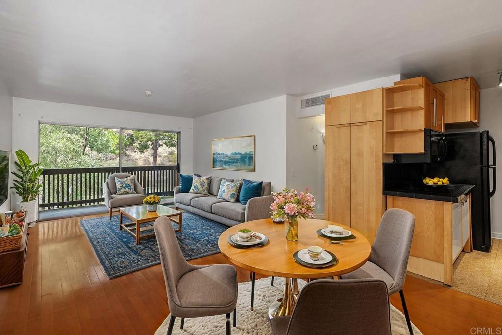 Welcome to your new condo that lives like a vacation! Natural light fills this freshly painted west Fashion Valley condo, featuring an open floor plan with an updated kitchen and bath. Both the private bedroom and the living room open to a spacious balcony with beautiful hillside views. The home also includes a walk-in bedroom closet, two roomy hall closets, and central air. The gated building offers assigned underground parking and elevator access. Step outside and enjoy the resort-style amenities: lush tropical landscaping, two pools (one right outside your building), spa, tennis courts, BBQs, and a large clubhouse with a gym, kitchen, library, ping pong and billiards tables, and a cozy fireplace. This FHA and VA-approved complex is ideally located near beaches and the bay, downtown San Diego, the airport, Petco Park, Snapdragon Stadium, Balboa Park, YMCA, top shopping and dining, major freeways including the 8, 5, 15, 805 & 163, the trolley, and San Diego’s outstanding universities, including SDSU, USD, and UCSD. Light, lifestyle, and location- Let’s get the ball rolling!