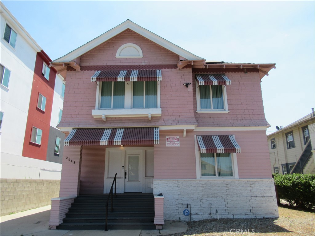 Located in the highly desireable Mid City neighborhood. This Victorian home has a great upside for development or student housing, as just minutes from USC. With some TLC you could create some nice rental income and restore some of the character of this classic home from the early 1900's .Rear of the property has lots of space to add ADU or possibly units (Buyer is to Verify with City) Property is Gated and has a private driveway and good size front yard . Lots of parking available and alley to the rear to make any kind on construction easier. Close to freeways, USC campus and shopping, dining etc. Lots size approx 7102 sq ft and zoned RD1.5 This is a real opportunity knocking.