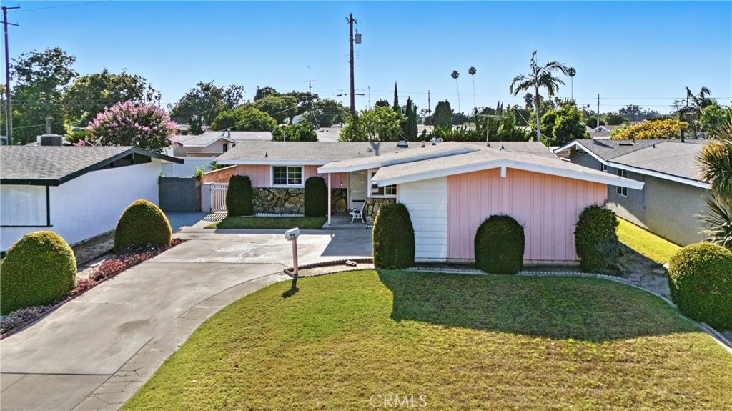 Welcome to your dream home at 8349 Alburtis Ave, nestled in the charming neighborhood of Los Nietos Whittier. This stunning mid-century modern gem invites you into a world of style and comfort that perfectly blends vintage charm with contemporary living. With 1,254 square feet of thoughtfully designed space, this home offers three spacious bedrooms and two well-appointed bathrooms, making it ideal for any lifestyle. Original four bedrooms but one the bedrooms was converted to make a bigger family room. Title shows four bedrooms
Step into the heart of the home and be captivated by the beautiful clerestory windows. These architectural wonders allow natural light to flood in, creating a warm and inviting atmosphere throughout the living spaces. Picture yourself sipping coffee in the stylish living room, basking in the sunlight that dances across the solid wood cabinetry in the kitchen. Here, culinary dreams come to life, providing you with the perfect backdrop for both everyday meals and festive gatherings.
One of the standout features of this property is the expansive 5,800 sqft lot. Imagine hosting barbecues in your backyard or simply unwinding in the shade of mature trees. This outdoor space is a canvas waiting for your personal touch, whether you envision a vibrant garden, a cozy fire pit, or an open-area oasis for summer nights and surrounded by fruit trees Plus, the convenience of a two-car garage offers easy parking and extra storage.
Located just minutes from Pioneer High School, this home ensures access to quality education, making your commutes a breeze.
In this picturesque neighborhood, you'll enjoy a sense of community and tranquility that’s hard to find elsewhere. From friendly neighbors to nearby parks, schools, this area is the perfect backdrop for making cherished memories. Every corner of this home tells a story, and it’s waiting for you to start yours.
Don't wait—come and experience the charm and elegance of this mid-century modern home. It’s not just a place to live; it’s a lifestyle waiting to be embraced. Your future begins at 8349 Alburtis Ave, where comfort, style, and adventure await!