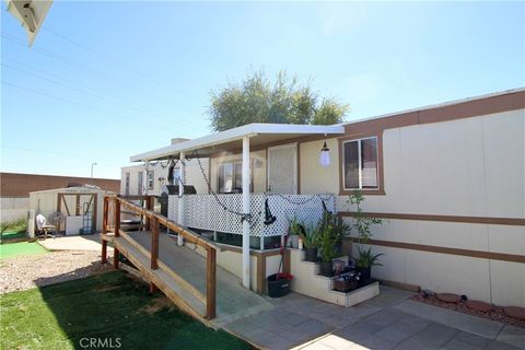 Photo of 11423 Chamberlaine Way #58, Adelanto, CA 92301 (MLS # DW25252760)