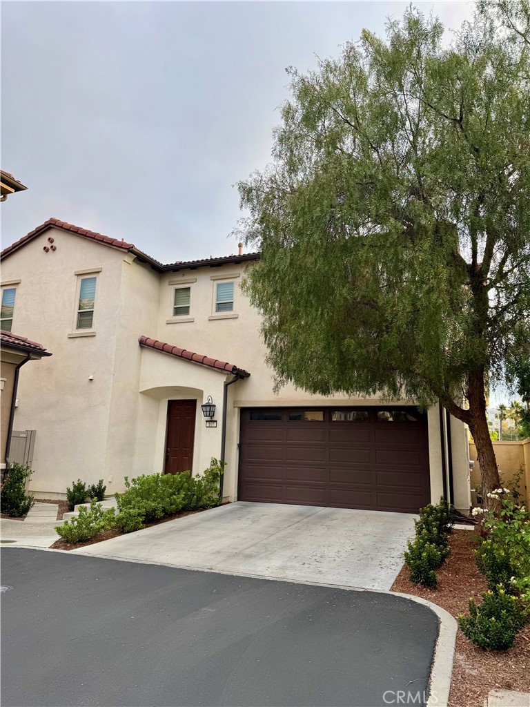 Tucked inside the exclusive gated community of Camden Square. This pristine detached single family home is located on a corner end location Very light and bright interior enhanced by light coming in from three sides. The 1,901 square feet, 3 bedrooms, 2.5 baths have a 10' ceiling height on the 1st floor and a 9' ceiling height on the second floor, a large master suite with a separate his and her vanity area, separate shower and tub, and an over-sized walk-in closet. The other rooms are also spacious. Upstairs laundry area comes with a sink and accommodates full size washer/dryer. Light paint, upgraded shower wall and vanity wall tiles and mirrors in master bathroom, upgrade flooring on all bathrooms and downstairs, upgraded lighting above island and dining area. Backyard has been landscaped w/artificial grass. 2-car garage + rare 2 car driveway. The community features a community pool, spa and a playground. It is few minutes away from award winning schools, the beautiful Whiting Ranch Wilderness Park, and 241 toll roll the I-5 Freeway.