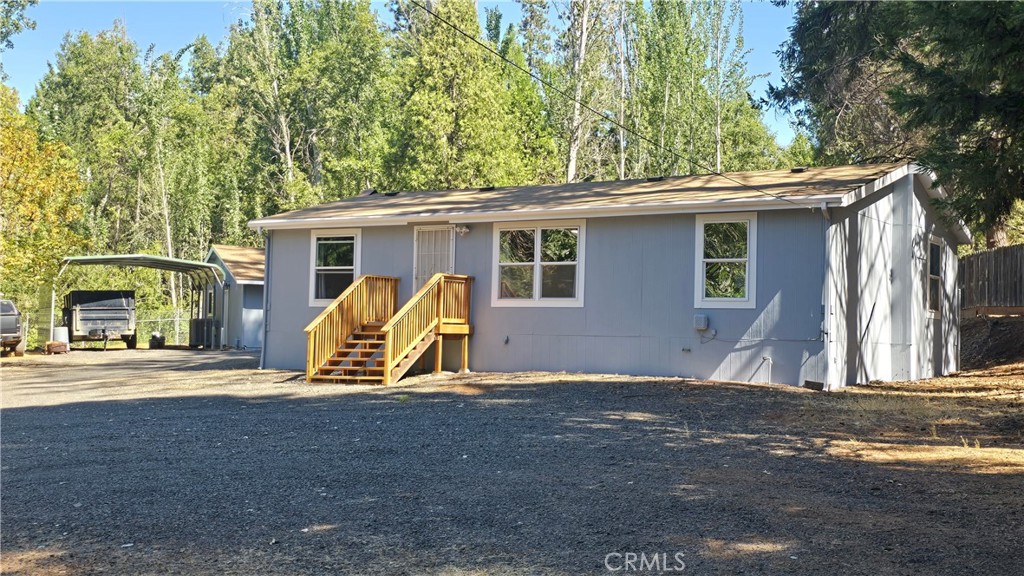 FRESHLY REMODELED AND MOVE IN READY! This 3-bedroom, 2-bath home offers a desirable split-bedroom floor plan and has been thoughtfully updated with new laminate flooring, fresh interior paint, all new LED lighting, and a brand-new front porch. Step inside to an open concept living space with vaulted ceilings that create a spacious and airy atmosphere, connecting the living room, dining area, and kitchen with ease. The kitchen is light and bright with a skylight, ample cabinets and counter space, a 5-burner gas range with oven, refrigerator included, and a breakfast bar for extra seating. The laundry room doubles as a mudroom with convenient backyard access to a fully fenced and gated backyard area—perfect for pets and people alike. The primary suite is generously sized and features a walk-in closet plus a beautifully remodeled bathroom with a custom tile walk-in shower. On the opposite side of the home, you’ll find two comfortable guest rooms and a full guest bath with a tub/shower combo. Sitting on nearly an acre, the property offers plenty of usable space with a 24' x 28' detached garage/shop equipped with power and water, an adjacent metal carport, and a storage shed. The grounds have been fully cleaned and cleared, giving you endless options for gardening, recreation, or expansion. The entire property is also fully fenced and offers 2 gated driveways allowing for a large circular driveway access if needed and huge amounts of open land and parking space! There is also an oversized 500-gallon propane tank that is fully owned so you can shop for your best gas prices and fill up during the summer when prices are lowest and take advantage of the extra savings and double the usual amount of storage space. Also, for outdoor lovers and adventurer seekers, there are countless activities just waiting for you. This property is only minutes from countless opportunities for boating, fishing, swimming, skiing, hiking & biking, with several lakes, streams & rivers to choose from. There are also lots of off-road options & camping, plus snow mobiling in the winter! Call today for more information about this home and its location!
All this, tucked just off Skyway on a quiet country road, yet only minutes from downtown Magalia with shopping, restaurants, a disc golf course, and Magalia Community Park, which hosts frequent community events.