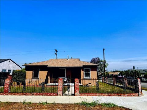Photo of 1851 W 96 Street, Los Angeles, CA 90047 (MLS # IV26087746)