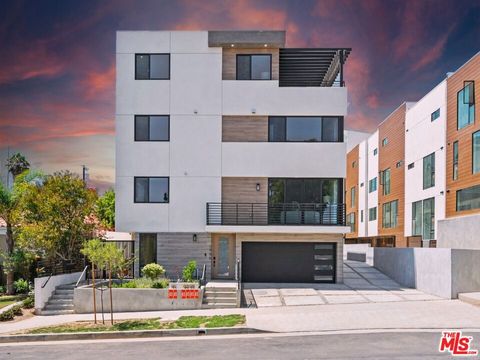 Photo of 1957 1/2 Preuss Road, Los Angeles, CA 90034 (MLS # 26643435)