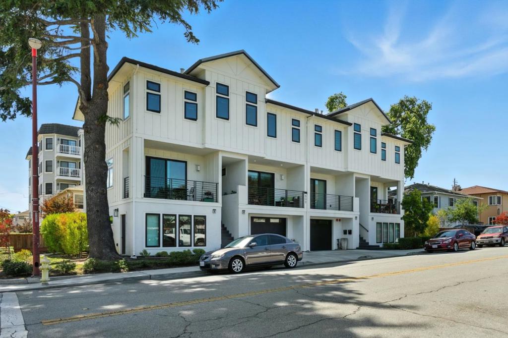 Welcome to 500 Walnut Street (2019) that perfectly combines Modern Comfort, Quietness and the Vibrant Lifestyle of San Carlos.From the moment you step inside,youll feel the thoughtful design meant for todays living.2 spacious,modern BED are complemented by a fully independent DEN,ideal as a Home Office,Guest Retreat, Creative Studio, or simply extra storage space to keep life organized.The home also features 2 private balconies, extending your living space and offering the perfect spot for morning coffee or evening.An inviting island and abundant cabinetry provide that rare mix of style and function,offering both a place to gather and more storage than youd expect.With quality appliances and generous counter space,the kitchen is designed for easy weeknight dinners as well or entertaining with friends. Hardwood floors run throughout, while large windows bring in natural light, filling the home with warmth from sunrise to sunset.Practical touches,like an EV charger installed in the garage,make daily life even easier.Just a minute away,youll find the charm of downtown San Carlos and lively Laurel Street, with its cafés,restaurants and beloved Sunday farmers market. Top-rated schools add even more appeal and with Caltrain & major freeways, commuting couldnt be more convenient.