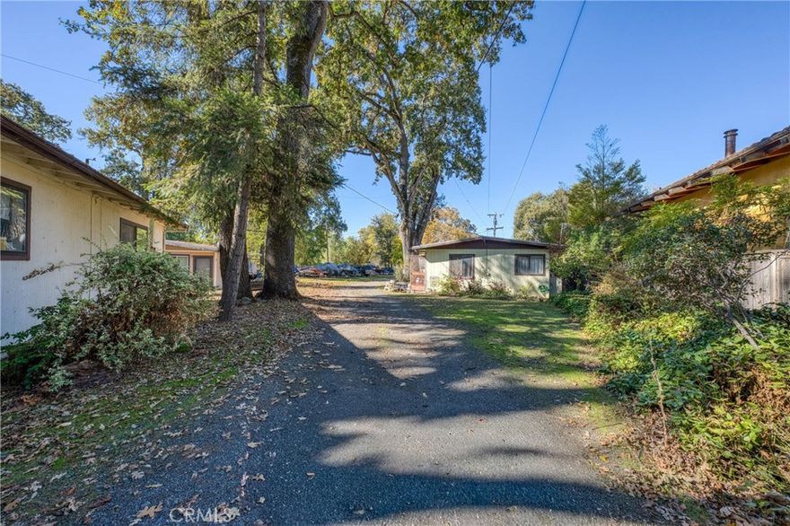 Acres Five Association - Dual Residences with Lake Access & Two Docks Discover a rare lakefront property in the peaceful Acres Five Association featuring two private docks, beach access, and scenic Mount Konocti views. This one-of-a-kind compound includes a quaint duplex (Spaces #5 & #6) and purchase the Manufactured home next door is a 1977 manufactured home (Space #7), offering a total of 1,752 sq. ft. of combined living space. The duplex cabins provide two separate 1-bedroom, 1-bath units, each with its own kitchenette and cozy living area. Perfect for extended family or guests, the cabins are steps from the water and surrounded by serene, well-kept grounds. Enjoy peaceful mornings and colorful sunsets from this quiet lakefront setting. Next to the duplex, the main manufactured home offers 2 bedrooms, 2 baths, and a spacious layout. The primary suite can easily convert into a third bedroom. An all-electric kitchen with ample cabinetry and counter space connects to an open dining area with a built-in hutch. The front deck is ideal for morning coffee or evening relaxation overlooking the lake. Perfect for full-time living, retirement, or a weekend retreat. Approx. 1,752 sq. ft. (600 + 1,152) Built 1977 Two docks Beach & lake access Mt. Konocti views Close to dining & shops