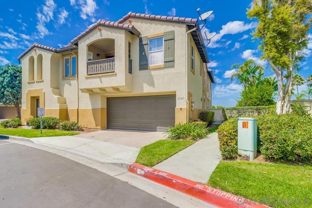 This beautiful 3-bedroom, 2.5-bath rental offers comfort, style, and convenience in a highly desirable community. The spacious living room features a cozy fireplace, while the updated wood plank floors and tile add a modern touch throughout. The master suite boasts a private balcony with stunning views, a walk-in closet, and plenty of natural light. Enjoy relaxing or entertaining on the great patio with its peaceful outlook. The community provides access to a sparkling pool and is ideally located near parks, schools, and a variety of restaurants—perfect for both families and professionals looking for a vibrant yet tranquil lifestyle.