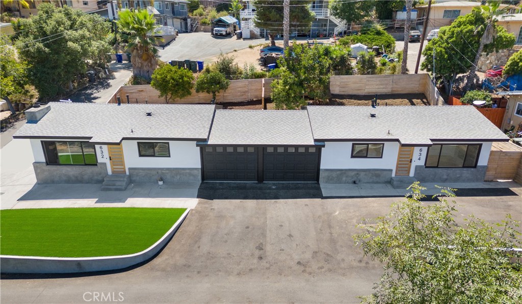 Beautifully Remodeled Duplex in the Heart of Vista, CA... Welcome to this stunning, fully remodeled duplex located in the vibrant heart of Vista! This spacious unit features 2 bedrooms and 2 modern bathrooms, thoughtfully updated with stylish finishes and attention to detail throughout. Step into open-concept living spaces that offer cozy fireplace and gorgeous kitchen equipped with elegant waterfall countertops, deep farmhouse sink, and updated cabinetry—perfect for everyday living and entertaining. This unit includes its own 1-car attached garage, ensuring privacy and convenience for residents. Enjoy low-maintenance outdoor living with synthetic turf in both the front and backyards, creating the ideal space for relaxing, entertaining, or letting pets and kids play freely. The fenced backyard provides privacy and functionality, making it great for gatherings and family time. Recent improvements include brand-new asphalt paving, giving the property a fresh, clean look with plenty of additional parking available around the property.
Situated within walking distance to local grocery stores, shopping, coffee shops, and dining, this duplex offers the perfect blend of modern comfort and central convenience. Whether you're looking for a multi-generational living option or a place to call home—this property is a must-see!