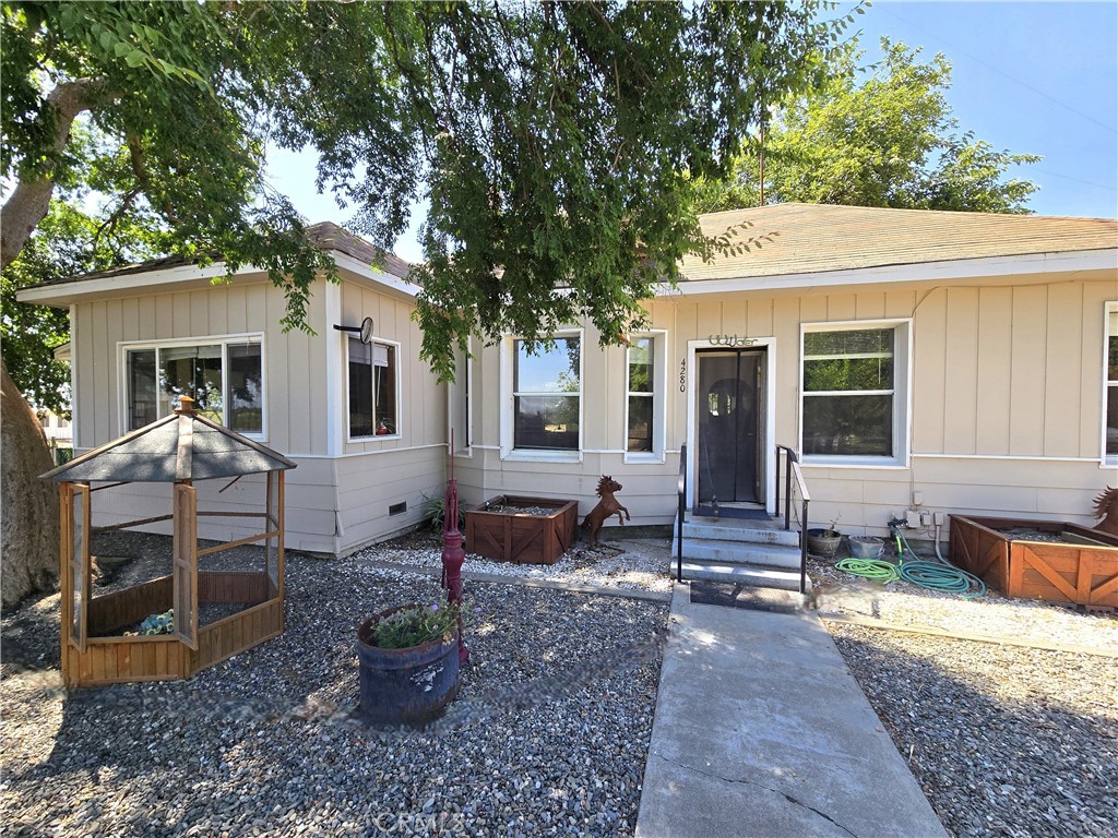 Two Homes! This 10.55-acre property offers a fantastic setup for livestock, currently home to a few sheep! It’s perfect for horses, cattle, goats, pigs, etc with approximately 8 acres flood irrigated through the local water district. The land features a barn, multiple stalls, outbuildings, and plenty of covered outdoor space. A standout feature is two separate homes on the property: Main Residence: A charming 3-bedroom, 1-bath craftsman-style home with 1,634 sq ft of living space, an updated kitchen, exposed wood beam ceiling, a bonus room, and a private backyard. Second Home: A well-equipped 3-bedroom, 2-bath 1,248 sqft manufactured home on a permanent foundation, currently tenant-occupied. The tenants are flexible and can stay or vacate at closing. Both homes have separate septic systems, and the entire property is fully fenced. Located in an area with only one distant neighbor, this property offers privacy, flexibility, and opportunity for a variety of uses. Buyers to verify any and all information to their satisfaction.