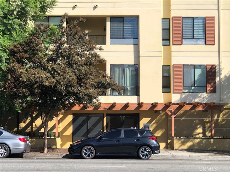 This is a beautiful condominium in the Laurel Bliss building in North Hollywood, built in 2006, with about two bedrooms and two bathrooms, around 880 to 950 square feet. The unit includes two gated parking spaces and access to amenities such as rooftop deck, fitness center, secure entry, and shared common areas. The property is located in the Los Angeles Unified School District.