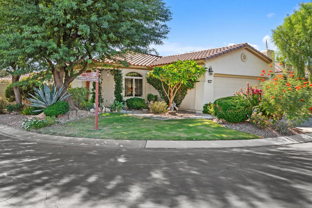 This tranquil and serene San Ysidro Retreat sits on a spacious 8,276/sf south-facing corner lot, offering privacy and easy access to amenities. The upgraded home features high ceilings, large windows, flexible living areas, tinted bedroom windows, tile and LVT flooring (no carpet), and a built-out walk-in closet. Recent improvements include new HVAC, a walk-in shower in the second bath, painted kitchen cabinets, a newer dishwasher, and an updated refrigerator. The private backyard features fruit trees, real grass, mature landscaping, and shade trees. Sun City Shadow Hills Community highlights include two golf courses, clubhouses, pools, fitness centers, tennis and pickleball courts, a restaurant, and social clubs. The property is being sold partially furnished. Make an appointment to see it today!