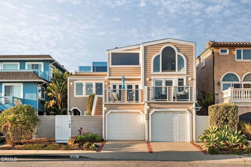 Sited on one of Pierpont's most coveted streets, Greenock Lane, this expansive coastal retreat captures endless whitewater views stretching across Ventura Harbor, the Channel Islands, and Marina Park. With over 3,800 square feet of living space, five bedrooms, and four bathrooms, the residence blends scale, flexibility, and quintessential Southern California beach living.The oversized entryway opens to a versatile first level featuring two spacious bedrooms, each with direct access to the backyard, along with a full bathroom, a comfortable den, a laundry room, and a two-car garage.Upstairs, the second floor unfolds into the heart of the home. Two additional bedrooms with private balcony access and two bathrooms share the level with an open-concept kitchen and dining area designed for both casual meals and entertaining. French doors in the family room invite you onto a sunlit balcony, while a separate living room with a fireplace provides a cozy retreat. From nearly every vantage point, sweeping ocean and island views create an ever-changing canvas of sea and sky.Crowning the residence, the third floor is devoted entirely to the primary suite, which features a fireplace, a large bathroom with soaking tub, separate shower, and walk-in closet, as well as a private balcony overlooking the Pacific.Set on an oversized, nearly 4,800 square foot lot, larger than most in Pierpont, the property offers ample outdoor space for gatherings with family and friends. With no neighbors directly across the lane and only steps to the sand, this rare offering is equal parts privacy, scale, and coastal living.