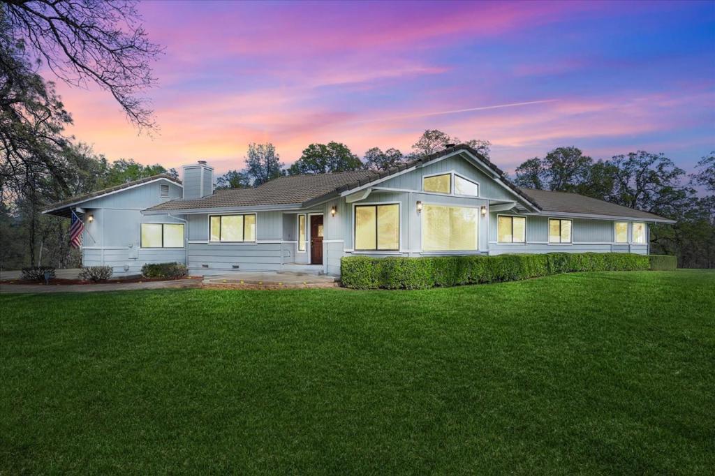 Your private adventure awaits! Nestled on 20+ acres in one of Reddings most sought-after neighborhoods, this 3-bed, 2-bath home offers nearly 2,900 sq ft of comfort, flexibility, and serene beauty. Wake up to birdsong and golden hills, sip coffee in the sunroom, or watch sunsets from the wraparound deck. Inside, enjoy open living spaces, cozy nooks, and thoughtful touches throughout. The attached garage adds convenience, while the detached SHOP is perfect for hobbyists, creatives, or extra storage. The land invites adventure! Build trails, ride ATVs, stargaze, host garden parties, or simply unwind in total peace. Surrounded by mature trees and open skies, its a blend of wild beauty and modern comfort. All this privacy just minutes from lakes, golf, and Reddings best. Looking for a place to breathe deeper, live bigger, and reconnect with nature? This is it. More than a home it's your homestead, your retreat, your next great chapter.