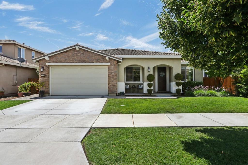 Welcome to this beautiful 4-bedroom, 2-bath immaculate single-story home, ideally situated in Gilroy's most desirable North-West neighborhood! Upon entering, you'll be greeted by a warm, open formal living and dining room. The heart of the home is the great room, featuring an expansive family room with a gas-burning fireplace, a modern kitchen, and a cozy breakfast nook. The kitchen is a chef's delight, equipped with a 9-foot island with seating, upgraded cabinets, granite countertops, stainless steel appliances, and a gas range with a hood. The primary suite offers a true retreat, boasting French doors that open to the lush backyard. You'll find two additional bedrooms down the hall, while the fourth bedroom is currently utilized as an office/den but can easily be converted back to the 4th room. Step outside through the enchanting French doors to a charming backyard, designed for relaxation and gatherings. It features lovely low-maintenance landscaping, an attached covered patio with fan, a wood pergola, and beautiful green hedges. As an added bonus, enjoy fresh fruit from your very own apple, peach, and apricot trees. Ample storage is provided by a custom-built 5'x16' shed with dual entry, perfect for a workshop or extra storage. No HOA Dues here! Welcome Home!