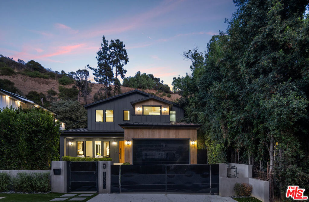Experience luxurious living in this brand-new modern farmhouse, nestled in the prestigious Beverly Hills Post Office area, just north of Sunset Boulevard and Coldwater Canyon Park. This thoughtfully designed home offers 6 bedrooms and 8 bathrooms across three spacious levels, perfect for both family living and entertaining. The expansive backyard is an entertainer's dream, featuring a sparkling pool, spa, built-in fire pit, and BBQ, ideal for hosting gatherings on warm evenings.Inside, a striking staircase with custom LED accent lighting ties the home together, offering a seamless flow between the main living areas. The main level showcases elegant formal spaces, a home office, and a chef's kitchen with custom countertops, a large center island, and top-tier applianceseverything you need for cooking and entertaining in style.Upstairs, retreat to the peaceful primary suite, which includes a luxurious bathroom with a soaking tub, dual shower, and a spacious walk-in closet. Three additional ensuite bedrooms and a private outdoor deck provide stunning views of the canyon, offering a tranquil escape from the city.The lower level is designed for leisure, with a wet bar, gym, home theater, and large family room, perfect for relaxation and recreation. Outside, the backyard sets the stage for outdoor fun, with plenty of space for lounging or hosting events.Situated minutes from Coldwater Canyon Park, The Beverly Hills Hotel, and the finest shopping and dining Beverly Hills has to offer, this home delivers the ultimate combination of privacy, luxury, and convenience.