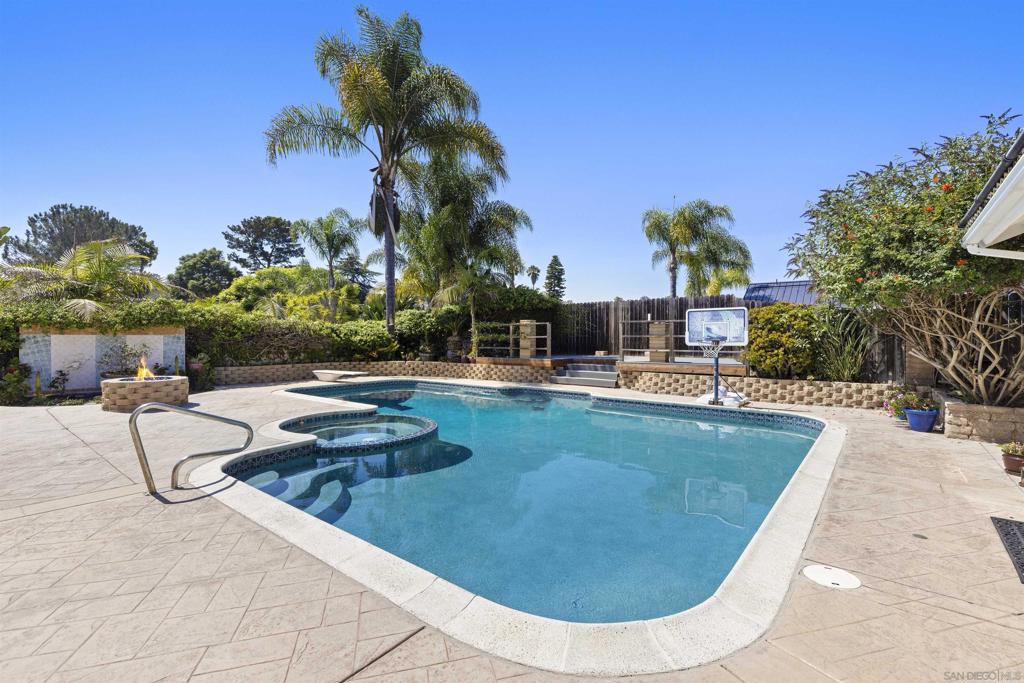 Welcome to 1510 Orangeview Dr, a beautifully updated home tucked away on a quiet cul-de-sac in Encinitas, CA. The single-story main house features 4 bedrooms and 2 bathrooms with a bright, open layout that blends comfort and function. A permitted detached guest house offers 1 bedroom, 1 bathroom, a full kitchen, and laundry—perfect for extended family, guests, or rental income. It overlooks the saltwater pool and spa, which are solar-heated for year-round enjoyment. The open-concept kitchen boasts professional-grade appliances and granite countertops, flowing seamlessly to the spacious backyard—ideal for entertaining. Recent upgrades include custom-tiled bathrooms, hardwood and tile flooring, newer solar, HVAC, and a new water heater. The outdoor space is a true retreat with a BBQ area, pool and spa, deck, and firepit—a perfect setting for relaxing or hosting. Just minutes from the beach, shopping, dining, and entertainment, and located within the highly regarded San Dieguito Union High School District, this home offers the best of coastal living in a prime location.