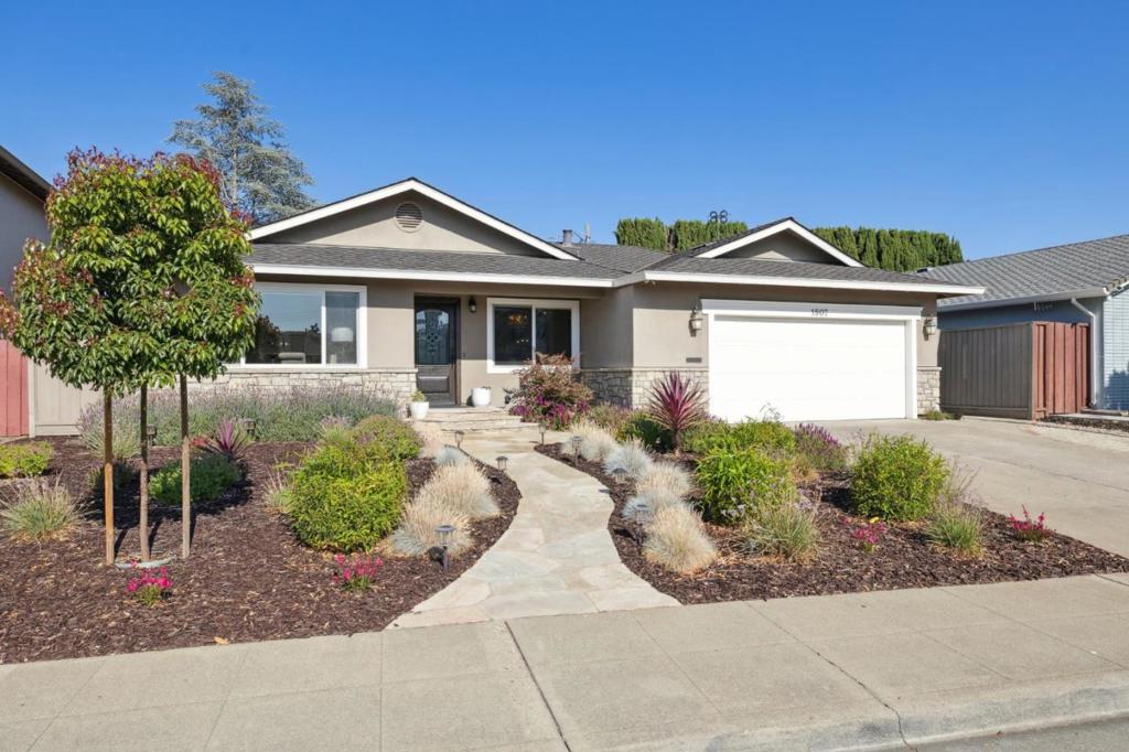 Spacious and beautifully updated, this classic Craftsman-style home is perfectly located in the sought-after Ortega Park neighborhood near excellent schools, parks, high-tech employers, and just minutes from downtown. Rich hardwood floors, crisp white trim details, and a designer color palette unite the expansive 3-bedroom, 2-bath floor plan to create a stylish ambiance. Ideal for every lifestyle, the elegant living room and formal dining room are ready for gracious entertaining, while the bright great room, with gorgeous chefs kitchen and family room with fireplace, invites relaxed everyday living. A true haven, the graceful primary suite features a huge, customized walk-in closet and lovely bath. The large backyard has an entertainers patio, lots of room for play and future gardening, plus colorful plantings. Completing this appealing picture, the home is a block to highly rated Stocklmeir Elementary and Ortega Park, plus just minutes to restaurants, shopping, and high-tech employers. Welcome home!
