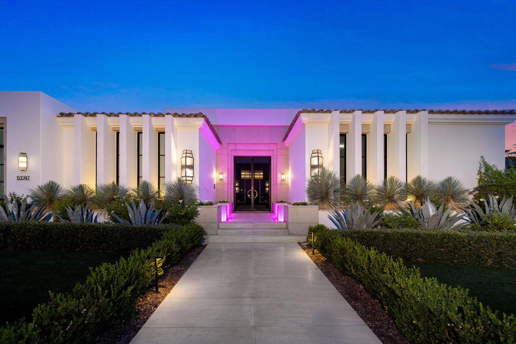 Modern masterpiece on prime west facing location at the Hideaway! 6 bedroom, 6 baths plus two powder rooms including a one bedroom casita plus two offices. Approx. 8,410 sq. ft. on .53 acre lot. Incredible curb appeal on this 2021 estate with elegant double door entry to beautiful courtyard with custom fire pit. Formal entry to great room with fireplace, media and modern gourmet kitchen with center island / breakfast bar, state of the art appliances, breakfast nook and prep kitchen. Formal dining room with glass display wine cellar and built-in buffet. Media/ game room with amazing custom bar. Handsome office with built-ins and second workspace. The finishes on this property are exquisite with no expense spared including custom lighting throughout, fine woods, luxurious textures and fixtures. Large master suite with fireplace and media, triple vanity bath with soaking tub, glass door shower and the ultimate dressing room closet. Inviting guest suites including a one bedroom casita with living room and upstairs suite with living room, kitchenette and view balcony. Pocket doors open to extended loggia with outdoor living and dining, custom fire pit wall and BBQ center. One of a kind custom pool with raised spa and tanning shelf with inlaid fire pit. Your own private putting green and the best west facing mountain backdrop views overlooking the 5th fairway of the Pete Dye course. This is a must see property! Offered furnished per inventory. Hideaway membership is available.