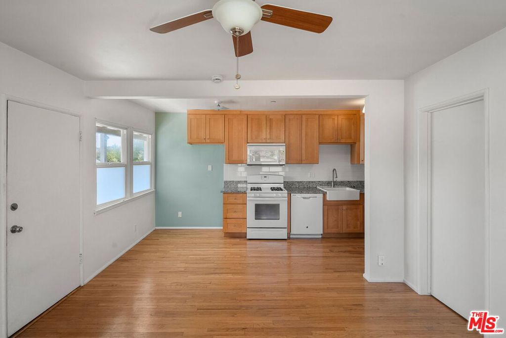 Bright, charming, and ideally located this beautifully remodeled 1 bed, 1 bath upper unit offers the best of Eagle Rock living. The kitchen and bathroom have been stylishly updated, while gleaming hardwood floors and abundant natural light throughout create a warm, inviting atmosphere. Nestled just off the vibrant intersection of Eagle Rock and Colorado Boulevards, you're perfectly positioned to enjoy the neighborhood's best cafes, shops, and restaurants all within easy walking distance. And when it's time to unwind, retreat to this peaceful, light-filled space that blends vintage charm with modern convenience. Minutes from Occidental College and an easy commute to surrounding neighborhoods, this is urban living with a touch of serenity.