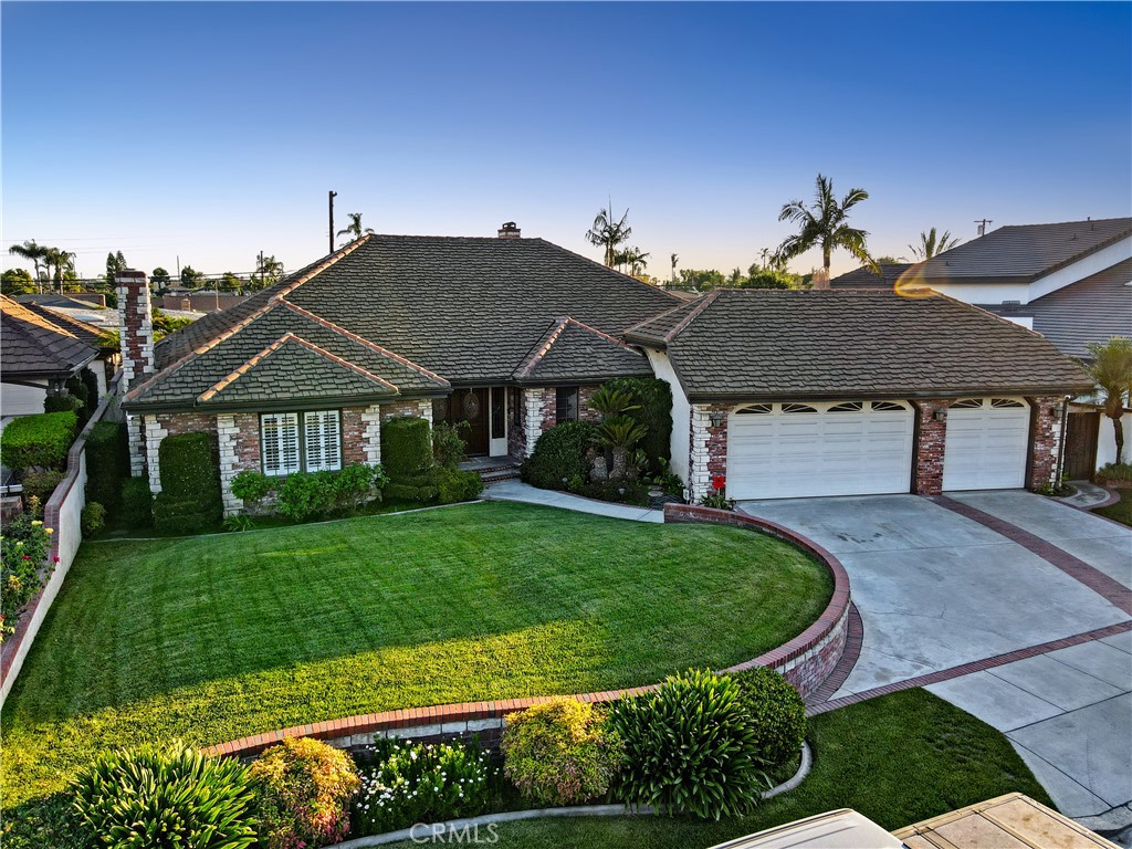 Gorgeous 4 bedroom single-story pool home in Northeast Downey! The home was recently updated with beautiful 4x4 porcelain tile floors and fresh paint through out. The interior consists of a spacious sunken living room and family room both with fireplaces, formal dining room, light and bright kitchen with built in appliances, large pantry & newly painted cabinets & hardware, and large primary bedroom with walk in closet and a primary bathroom that boasts dual sinks, jetted tub and tile shower. Step out into the backyard which features an inviting patio and pool & spa. Other amenities include a spacious utility/laundry room, paid off solar panels with a back up battery, central air and heat and 3 car attached garage. This property is tucked in a cul-de-sac location in the newest neighborhood of Northeast Downey and near shopping, restaurants and close to the 5 and 605 freeways.