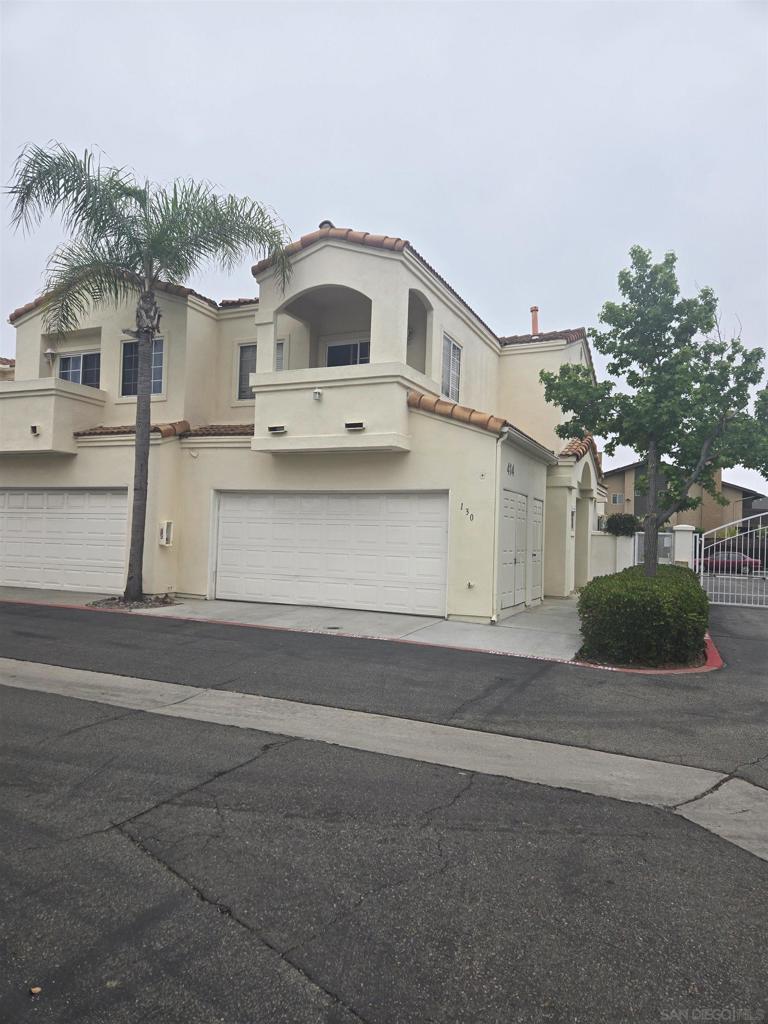 Charming townhome with dual master suites near Cal State San Marcos and Palomar College. This immaculate 2 bedroom, 2.5 bathroom corner unit townhome is located in the highly sought-after gated community of Villa Aspara. With only one shared wall, the well-designed floor plan offers both privacy and comfort, making it ideal for families or roommates. The home features dual master bedrooms upstairs, each spacious and filled with natural light. The main master includes a walk-in closet, and both bedrooms offer plenty of room to unwind. Downstairs, you’ll find a convenient half bath for guests and in-garage laundry for added ease. The living area boasts beautiful new flooring and a cozy fireplace. Step out to your own private backyard space, ideal for grilling, entertaining, or playtime. Villa Aspara offers peaceful grassy areas, quiet streets, a well-sized community pool, and two lovely courtyards with fountains and lush landscaping. The location is unbeatable; just minutes from Cal State San Marcos, Palomar College, major freeways, schools, coffee shops, restaurants, and entertainment. This is a rare opportunity to own a well-cared-for home in a quiet, convenient community.