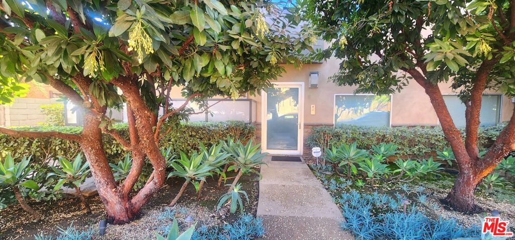 Amazing front Townhome in three unit building one block from Beverly Hills. It is built as if it were a single family resident as if there are no connections to the other units. Light and bright, this large 3 story, 3 bedroom property has all the amenities that are needed for city living. Located in Norma Triangle of West Hollywood, this amazing location allows you to walk into both West Hollywood's trendy Santa Monica Blvd or walk into Beverly Hills. Bamboo wood floors throughout, gourmet kitchen with top of the line appliances and patios galore! Each level has its own large spacious outdoor space, including a rooftop deck with amazing views of the Hollywood Hills. Private entrance is on Keith, with lovely succulent garden leading up to the front door. 3 full bathrooms, private laundry room, and 2 car tandem parking garage that leads to the private entrance into townhome. Extremely private, from every room. Master suite has cathedral ceilings and an incredible built out walk in closet. Easy to show!