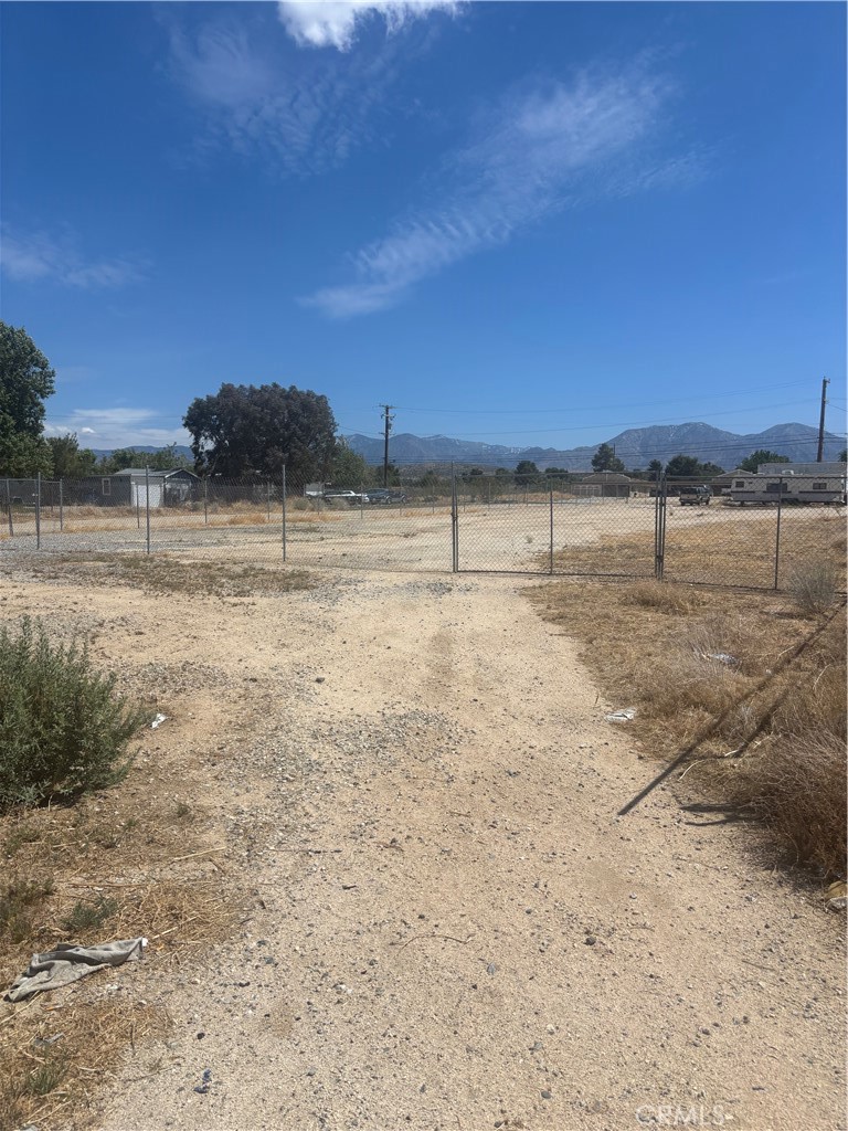 Pearblossom Commercial fronting on heavily traveled Pearblossom Hwy (138) which connects the 14 fwy to the 15 fwy. Paved frontage with electric and water in the street.There is a lot of development happening in the area, do not miss your opportunity to own a prime piece of land off of a route into the Antelope Valley. Mobile Home is part of this deal.