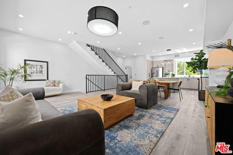 Photo of 1957 Preuss Road, Los Angeles, CA 90034 (MLS # 25591095)