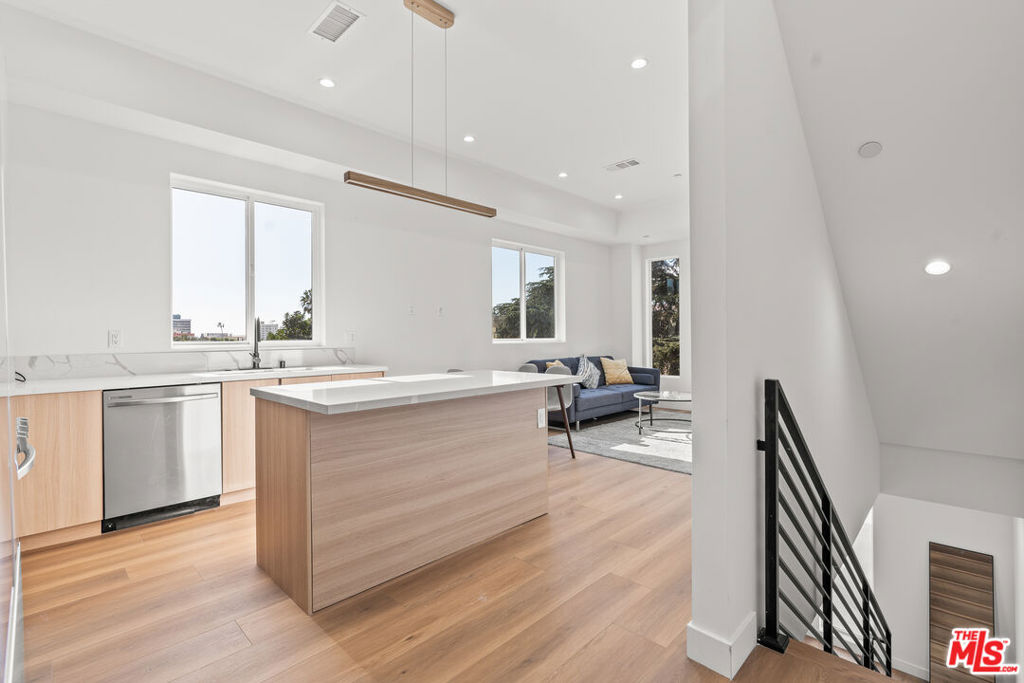 3 BEDROOM + 3 BATHROOM + PRIVATE ROOFTOP DECK & 2 CAR GARAGE! CENTRAL A/C IN-UNIT WASHER/DRYER PET FRIENDLY. Discover this stunning residence that perfectly combines modern style, open-concept design, and a prime location near Silver Lake. Thoughtfully designed with spacious closets and private balconies, this home provides a seamless indoor-outdoor lifestyle. Enjoy your own peaceful front yard ideal for morning coffee or evening unwinding and retreat to your private rooftop deck with sweeping city views, perfect for entertaining or relaxing under the stars.Located just minutes from the heart of Silver Lake, you'll be immersed in one of LA's most dynamic neighborhoods, known for its creative energy, boutique shopping, indie cafes, and acclaimed dining spots. Whether you're walking around the Silver Lake Reservoir, exploring local hotspots, or enjoying the comfort of your stylish new space, this home offers the best of urban living. Pet-friendly and beautifully appointed, this is more than a rental it's your next city sanctuary. Schedule a showing today! Photos may vary.