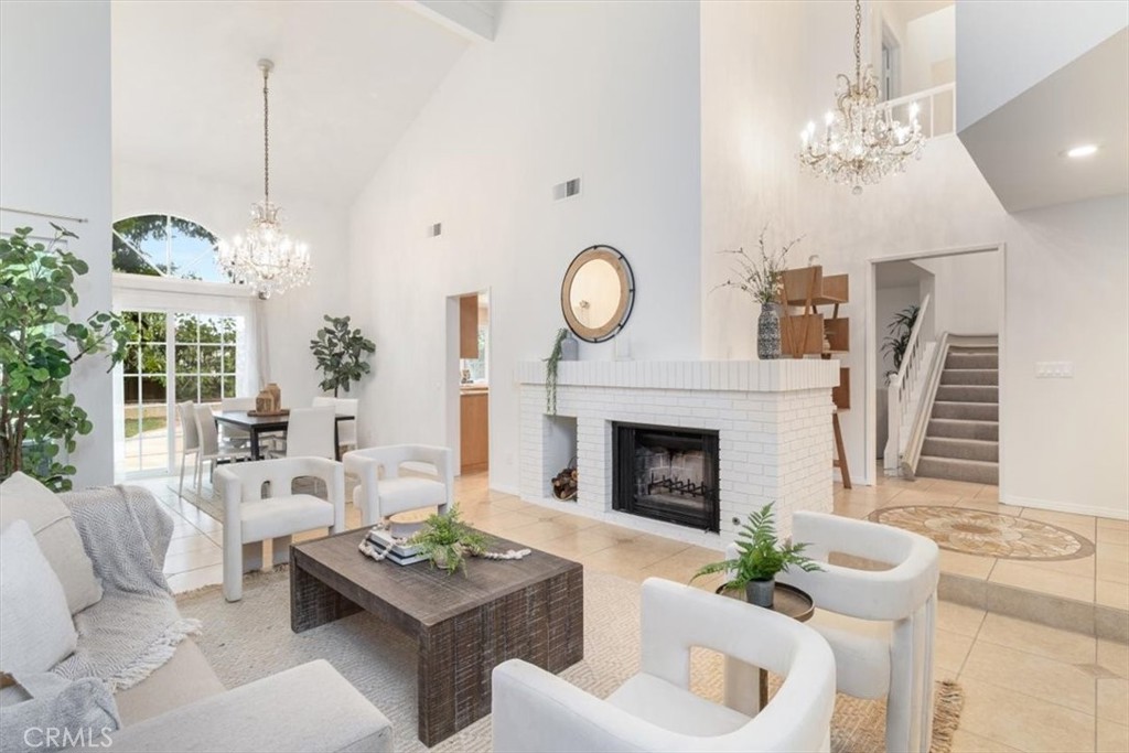 Welcome to 59 Carriage Hill Lane, a beautiful 4-bedroom, 2.5-bathroom gem in the sought-after Indian Creek community of Laguna Hills. This gorgeous home sits on a huge 6,000-square-foot lot with the largest backyard in the neighborhood! Step through the gated front entrance into a bright and airy living room with high vaulted ceilings and a cozy brick fireplace, flowing right into a spacious dining room—perfect for hosting friends and family.
The modern kitchen is well-equipped and connects to a warm family room with sliding glass doors that open to a lush backyard paradise. Enjoy a charming brick-lined patio and green lawn, ideal for relaxing or watching the 4th of July fireworks right from your own yard. A convenient half-bathroom and full-size laundry room lead to the attached two-car garage.
Upstairs, the large primary suite feels like a retreat with its high ceilings, private bathroom with dual sinks, and plenty of closet space. Three additional bedrooms and a full bathroom round out the upper level, offering ample space for family, guests, or a home office.
Perfectly located, this home offers unmatched convenience in Laguna Hills. You’re just a short walk from Laguna Hills High School (0.3 miles away) and minutes from top-rated schools like San Joaquin Elementary and Los Alisos Intermediate. Enjoy easy access to shopping and dining at nearby Laguna Hills Mall and Mission Viejo Marketplace, both within a 5-10 minute drive. Outdoor enthusiasts will love the proximity to local parks like Costeau Park and Aliso and Wood Canyons Wilderness Park for hiking and recreation. With quick access to the I-5 freeway and the 73 toll road, commuting to Irvine, Laguna Beach, or beyond is a breeze. This prime location puts everything you need—schools, shopping, dining, and outdoor fun—right at your fingertips.
This 4-bedroom, 2.5-bathroom home combines comfort, style, and a fantastic layout in a prime neighborhood. It’s the perfect place to call home!