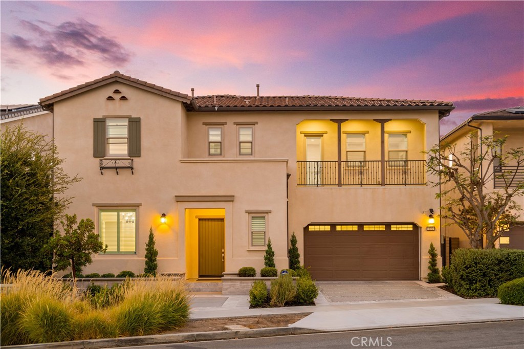 FORMER MODEL HOME at Great Park with over $700K in upgrades situated on an extra-large 7,843 sqft premium lot — a rare find. Upon arrival, the Spanish-inspired architecture and landscaping set the stage for elegance. Step inside to a dramatic two-story foyer with a curved staircase, leading to a spacious open floor plan filled with natural light. The chef’s dream kitchen features Wolf appliances and an extraordinary wall of four Sub-Zero units, quartz countertops, and an oversized island, custom backsplash, large walk-in pantry, seamlessly connected to the great room and California Room. Guest powder rooms on both levels, 5 bedrooms total, all bedrooms have an en-suite bathroom including desirable 1st floor guest suite. The original courtyard was transformed into a versatile lifestyle lounge with wood-plastic composite decking, and a modern fireplace. Upstairs, the primary suite retreat offers coffered ceilings, a spa-inspired bathroom with dual vanities, soaking tub, and a private balcony overlooking the backyard. Three secondary bedrooms and a generous loft provide comfort and flexibility.The 3-car garage and oversized mud room provide exceptional practicality. The resort-style backyard is a showstopper: a custom glass canopy with lighting, built-in BBQ, fireplace with TV, and triple water feature, perfect for entertaining. Located in the vibrant Great Park Neighborhoods, residents enjoy award-winning Irvine schools (Cadence Park K-8, Portola High), community pools, parks, and trails — all just minutes from shopping, dining, and freeways.