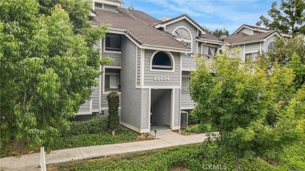Welcome to 20334 Rue Crevier Unit 620 in Canyon Country—a fantastic opportunity for first-time homebuyers or savvy investors looking for a strong rental income property. This move-in-ready home offers comfort, convenience, and desirable community amenities all in one. Inside, you’ll find soaring vaulted ceilings that create an open, airy feel, along with a versatile loft area that can serve as a third bedroom, home office, or guest space. The spacious kitchen provides plenty of room for cooking and storage, while the primary bedroom retreat features a private en-suite bathroom and a walk-in closet. Added convenience includes an in-unit washer and dryer, making everyday living a breeze. The property also boasts an oversized tandem 2-car detached garage with additional storage space, perfect for vehicles, hobbies, or extra belongings. Step outside and enjoy the well-maintained community grounds, complete with a sparkling pool, relaxing spa, and tennis courts—ideal for recreation and relaxation. Perfectly situated in Canyon Country, this home combines value, lifestyle, and potential. Whether you’re searching for your very first home or your next investment, Unit 620 at 20334 Rue Crevier checks all the boxes for modern living.