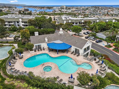 Photo of 950 Cagney Lane #201, Newport Beach, CA 92663 (MLS # NP26104063)