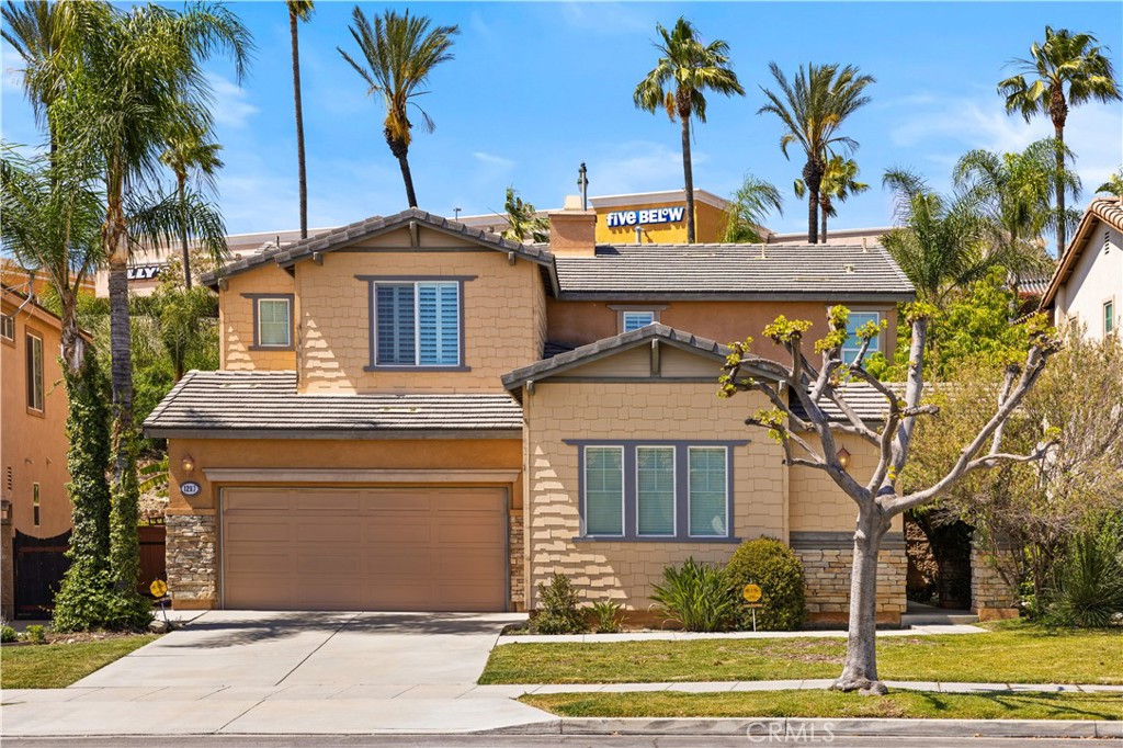 Welcome to your stunning new home in the Colonies of Upland. This magnificent two-story corner lot home boasts five bedrooms and five bathrooms spread across 3,235 square feet of living space, nestled on a 7,017 square foot lot. Prepare to be enchanted by the spacious open-concept kitchen and family room, perfect for entertaining guests with its expansive kitchen island and breakfast area. Revel in recessed lighting, granite countertops, backsplash, solid wood cabinets, and beautiful ceramic tile flooring. The family room exudes both grandeur and comfort, featuring a cozy fireplace, large windows offering serene views of the backyard, and ceramic tile flooring, This gem also includes a charming front door courtyard entry, formal living, and dining rooms, a main floor bedroom/office, and two bathrooms. Upstairs, unwind in the loft retreat before retiring to the spacious Master Suite, flooded with natural light from large windows or offering tranquility with its shutters closed. The master boasts multiple windows with shutters, complemented by an exquisite en-suite bathroom featuring an extra-long dual sink vanity, large soaking tub, expansive stand-alone shower, makeup vanity, and an enormous walk-in closet.
Additionally, the second floor hosts three more generously sized bedrooms and two full bathrooms. Outside, the backyard oasis awaits, offering the perfect setting for hosting gatherings with family and friends. You'll appreciate the convenience of the three-car attached garage, two AC units, indoor laundry room with sink and cabinets, and under-stairs storage. This home offers unparalleled convenience and luxury and is situated near the Colonies Shopping Center, 210 FWY, and Great Upland Schools. Don't miss the chance to make this gem your own!