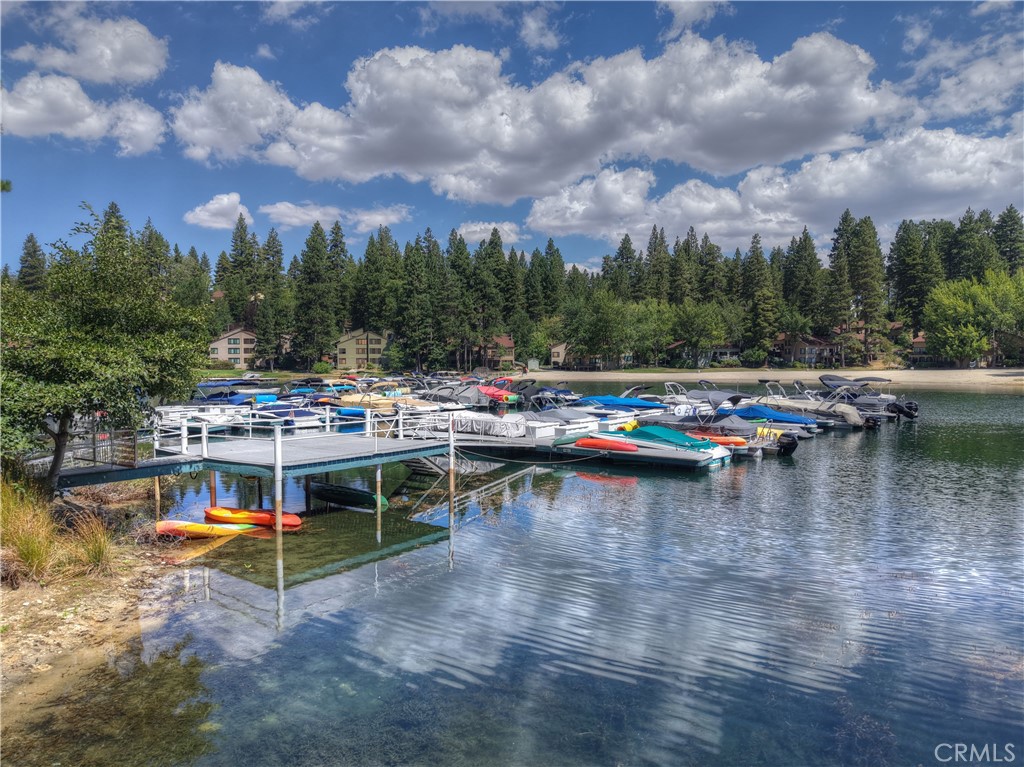 Meadow Bay Dock Slips provide everything you need for the perfect day on the lake. Convenient parking is available along North Bay Road with easy access through ALA gates #35 and #36. Enjoy the calm & peaceful waters nestled in the bay. Picturesque views of the sandy shoreline & lighthouse of Meadow Bay North. Nearby restrooms add to the convenience—an ideal amenity for long dock days & all your guests. Slip 14 is located toward the end of the multiple dock offering easier maneuverability and added privacy away from the shoreline. MBM3 features a spacious shared platform perfect for entertaining or relaxing by the water. Don’t miss this great opportunity to create memories and enjoy the seasonality of Lake Arrowhead!