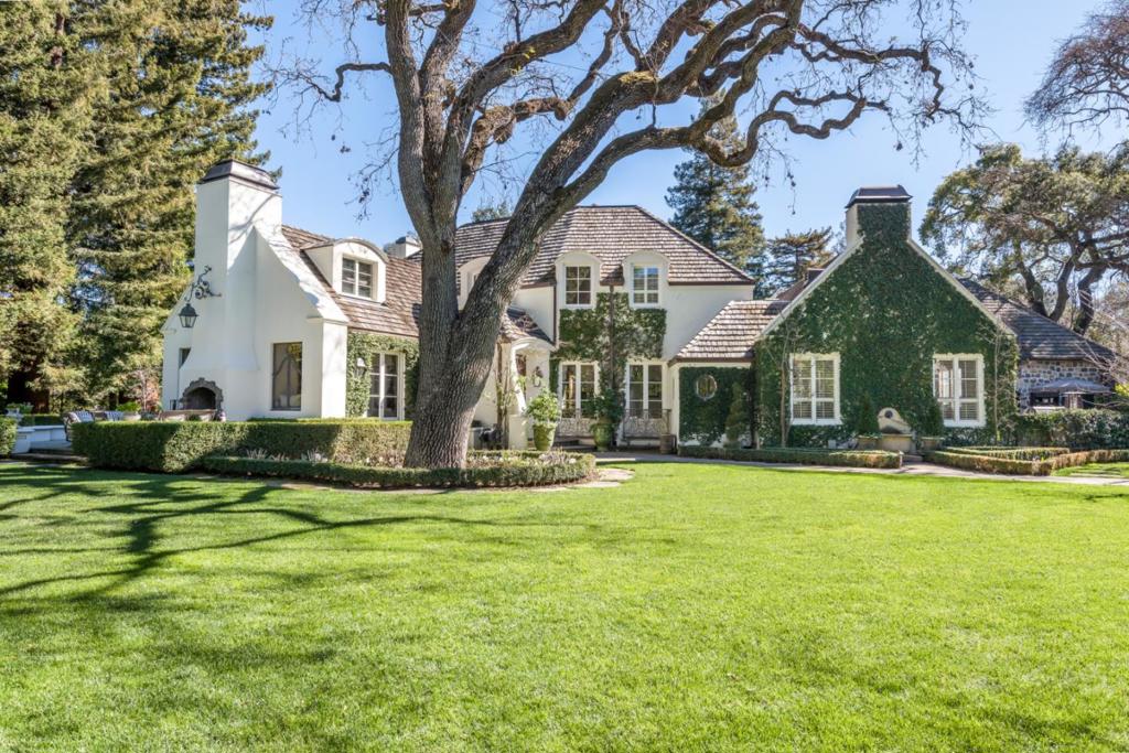 One of a kind, incomparable Atherton estate, gracefully nestled on over 1.35 acres of gorgeous manicured gardens studded with beautiful mature Oaks & specimen trees. Endless opportunity for entertaining & recreation indoors and out, at this incredible property. Features include: Main House: 4 Bedrooms/3.5 Bathrooms with 3 car attached garage & large covered, heated outdoor entertaining/bar area. Spacious LR, DR, Fam Rm & incredible gourmet Kitchen. Seven indoor & three outdoor Fireplaces; gorgeous custom features & finishes throughout. Separate Guest Quarters/Cottage: 1BD/1BA, Living Room w/FP, full Kitchen Pool House: Huge Living/Rec room with kitchenette & bathroom. Separate Gym: Spacious new, gym with high ceilings, Nanodoor, full bathroom w/ Steam Shower. Hot Tub, TV's. Gorgeous Pool & outdoor Kit/built-in BBQ, Tennis Court, In-ground Trampoline, Expansive Lawns, Beautiful Gardens, extra storage. Holbrook Palmer Park & Outstanding Menlo Park schools close by!