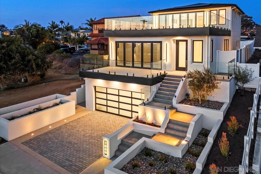 ** 180 degree Oceanview - New Construction Home with Luxurious Amenities** Experience breathtaking, unobstructed 180-degree ocean views from an expansive 900 square foot deck, perfect for dining and relaxing while enjoying sunsets and ocean breezes. This exquisite new construction boasts an ultimate indoor/outdoor living space that seamlessly integrates the family room, kitchen, and dining area. With four spacious bedrooms, each featuring its own private bathroom, this home provides both comfort and privacy. The gourmet kitchen is a chef's dream, equipped with top-of-the-line Viking appliances and a built-in refrigerator, ideal for culinary enthusiasts. The first of three custom homes to be built, located just a short walk or bike ride from the beach and downtown Encinitas. This property offers convenient access to vibrant shopping, delightful cafés, and entertainment options. Don’t miss the opportunity to own this beautiful home.