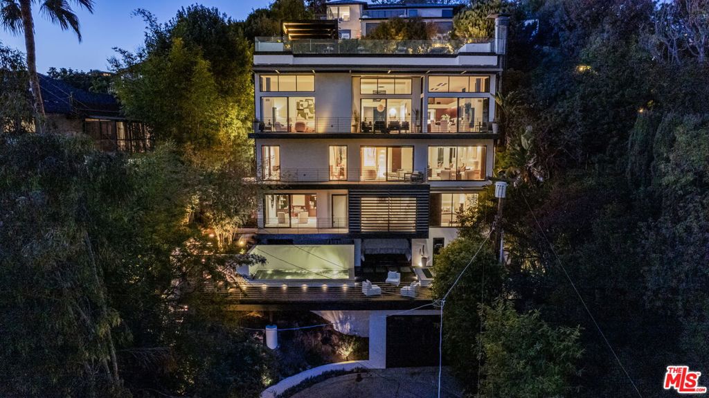 "Top of Hilldale" A Bird Street architectural masterpiece perched perfectly above the iconic Sunset Strip. Enter to stunning high ceilings flooded with natural light. Giant walls of glass open to terraces set amongst soaring trees with jaw dropping views from Downtown to Palos Verdes to Century City. Entertain on a grand scale, including possibly the most spectacular rooftop deck in the city. Sparkling heated pool with waterfall. Located at the end of coveted St. Ives Drive, this incredibly rare street-to-street lot features a separate private entrance on Hilldale Ave including 2nd garage (currently a finished studio); enjoy all the privacy and prestige of the best location in the Hollywood Hills yet moments to world-class dining and entertainment. Featuring 4 spacious bedrooms, all en suite, and everything else you expect: high end wood and stone finishes, travertine floors throughout, Control 4 system, elevator, outdoor chef's kitchen, bar, eight bathrooms, and total privacy. This gorgeous residence inspires creativity and serenity. MAY BE AVAILABLE FOR RENT FURNISHED OR UNFURNISHED.