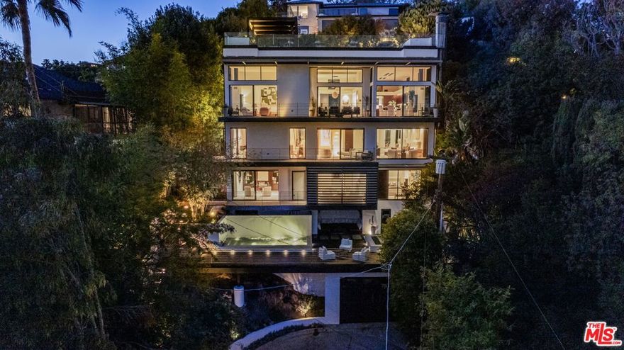 "Top of Hilldale" A Bird Street architectural masterpiece perched perfectly above the iconic Sunset Strip. Enter to stunning high ceilings flooded with natural light. Giant walls of glass open to terraces set amongst soaring trees with jaw dropping views from Downtown to Palos Verdes to Century City. Entertain on a grand scale, including possibly the most spectacular rooftop deck in the city. Sparkling heated pool with waterfall. Located at the end of coveted St. Ives Drive, this incredibly rare street-to-street lot features a separate private entrance on Hilldale Ave including 2nd garage (currently a finished studio); enjoy all the privacy and prestige of the best location in the Hollywood Hills yet moments to world-class dining and entertainment. Featuring 4 spacious bedrooms, all en suite, and everything else you expect: high end wood and stone finishes, travertine floors throughout, Control 4 system, elevator, outdoor chef's kitchen, bar, eight bathrooms, and total privacy. This gorgeous residence inspires creativity and serenity. MAY BE AVAILABLE FOR RENT FURNISHED OR UNFURNISHED.