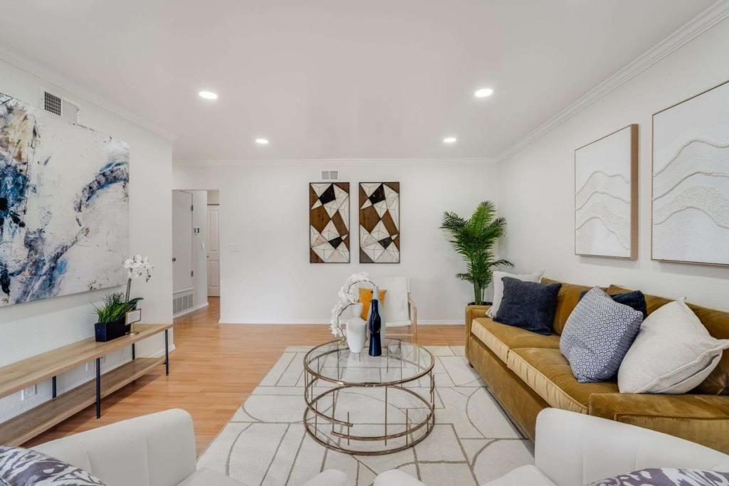 This top-floor, beautifully refreshed 2-bedroom, 2-bath condo in Greenhouse 2 blends comfort, convenience, and tranquility while keeping you connected to Silicon Valleys vibrant lifestyle. Offering 1,030 sqft, the home features an open layout, abundant natural light, and hardwood flooring throughout. The spacious living room flows seamlessly into a distinct dining space. A private balcony with storage provides serene views of lush greenery. The primary suite includes a walk-in closet and an updated bathroom. The kitchen and bathrooms have been remodeled with granite countertops. One-car garage with generous storage space plus an additional permitted parking. New furnace in 2021, other new updates in 2024 and 2025. Residents enjoy resort-style amenities, including a sparkling pool, clubhouse, picnic area, and pleasant walking paths. The expansive lawns, mature trees, and community-friendly setting make it ideal for social gatherings and relaxation. Located in the prestigious Palo Alto Unified School District, this home is minutes from Google, Intuit, Microsoft, Waymo, Stanford University, and major tech hubs. Nearby shopping includes San Antonio Shopping Center, Costco, Piazza, Trader Joes, and Whole Foods. With easy access to highways 101, 85, 237, Caltrain, and public transit.