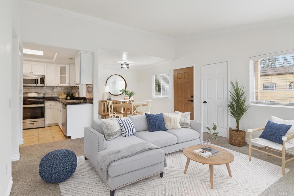 Welcome to this upper-level end-unit condo in the gated community of Stonemark at Los Morros, located in desirable North Oceanside. This beautiful 2-bedroom, 2-bath home offers vaulted ceilings and abundant natural light across its well-designed 900 square feet. The kitchen features granite countertops, stainless steel appliances, and a modern, open layout that flows seamlessly into the dining and living areas. Additional conveniences include in-unit laundry with washer and dryer, central A/C, and carpet throughout. Enjoy privacy and comfort with no neighbors above, plus a 1-car detached garage, an assigned parking space, and ample guest parking. Relax or entertain on the private balcony which has amazing views, or take advantage of the community’s resort-style amenities including a pool, spa, BBQ area, playground, and fitness center. Ideally situated just 8 miles from the beach, and close to shopping, restaurants, and Camp Pendleton. With low HOA dues covering water, trash, sewer, exterior maintenance, and roof, this property is perfect for first-time buyers, investors, or anyone seeking affordable coastal living in a well-kept, gated complex. Includes a 3 Year Home Warranty.