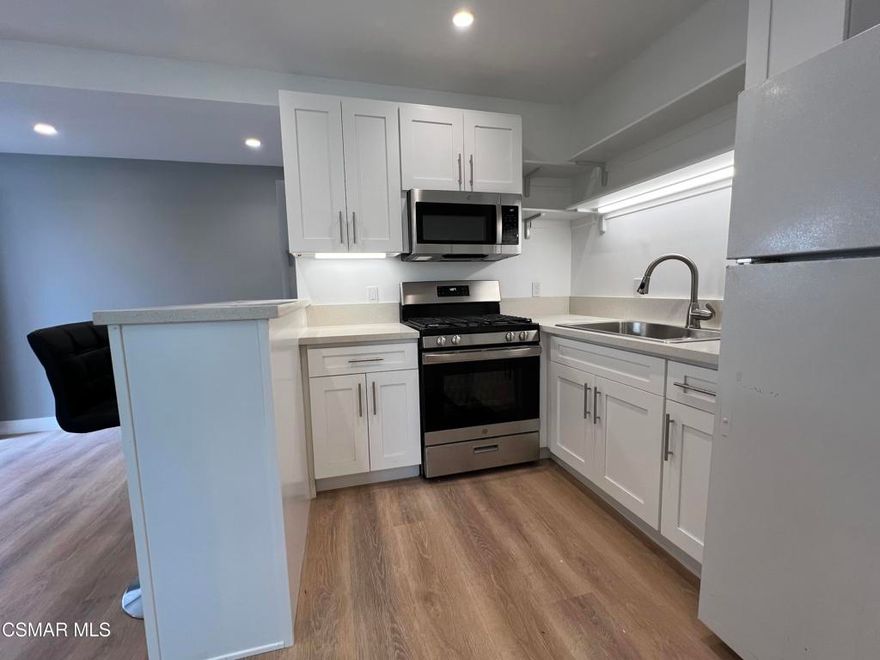 Welcome to this beautiful ADU in the heart of Thousand Oaks! With around 395 square feet of beautifully designed space, this unit has everything you need. The bright interior features a modern kitchen with plenty of cabinets, a stylish bar countertop for casual dining, and new stainless steel appliances, including a stove and microwave. The layout is spacious and thoughtfully designed, with a large closet and plenty of room to make the space your own. You'll enjoy the convenience of a private entrance on the left side of the home, plus essential amenities like a refrigerator, washer, and dryer already included. Complete with gorgeous flooring, recessed lighting, and a fresh, modern bathroom, this ADU is as practical as it is beautiful. Gas, electricity, trash , wifi and water are included, so you can settle in and relax. Located near schools, shopping, and dining, this is a perfect spot to enjoy all that Thousand Oaks has to offer!